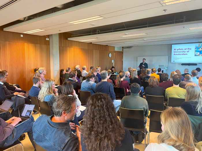 Classroom full of audience members during UvA Trends 2025