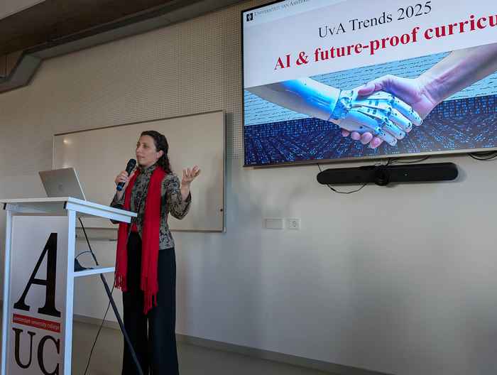 Keynote address during UvA Trends 2025 - person standing in front of an audience